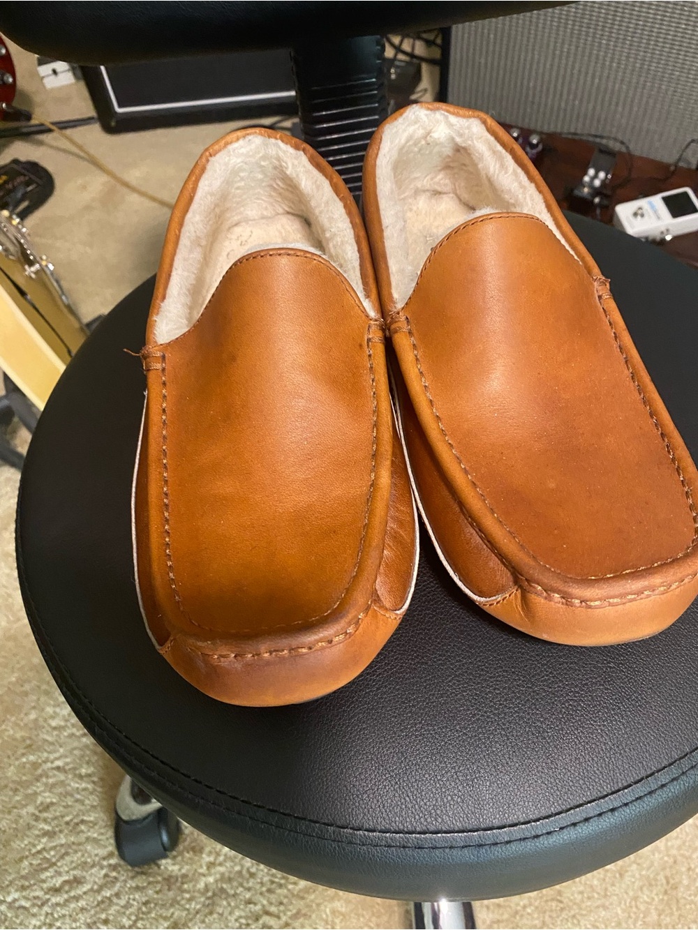 UGG Men's Chestnut Brown Leather Shearling Slip-Ons. Wool lining for warm feet.